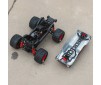 1/16 QUAKE GROM 4X4 RTR Brushed Monster Truck, Red 1/16 QUAKE GROM 4X4 RTR Brushed Monster Truck, Red